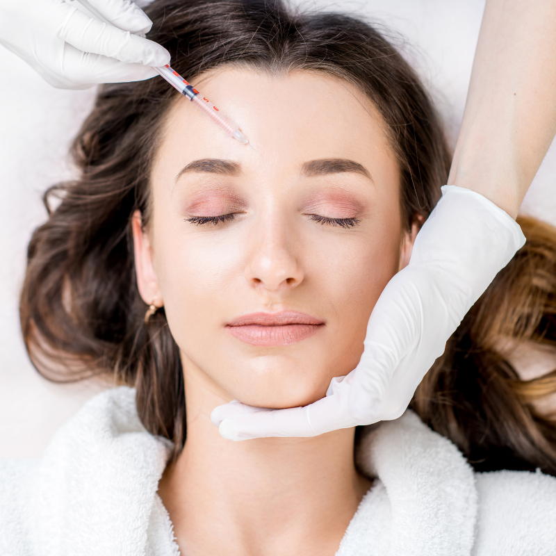 Women receiving BOTOX injectable treatment for $75 off (model)